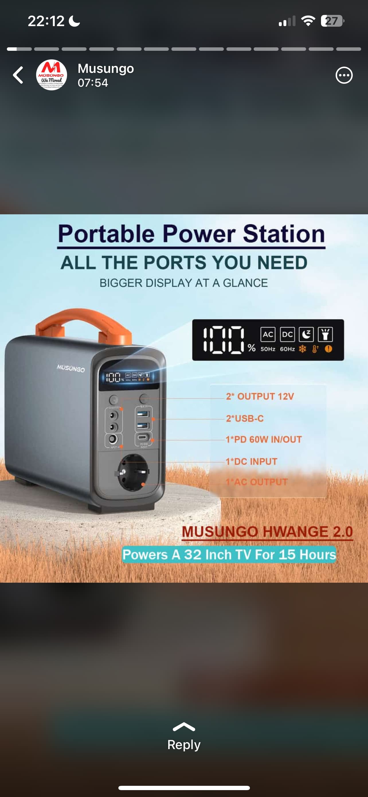 A portable power station perched on a round cement block pointing to the device’s IO and information display along with some marketing text