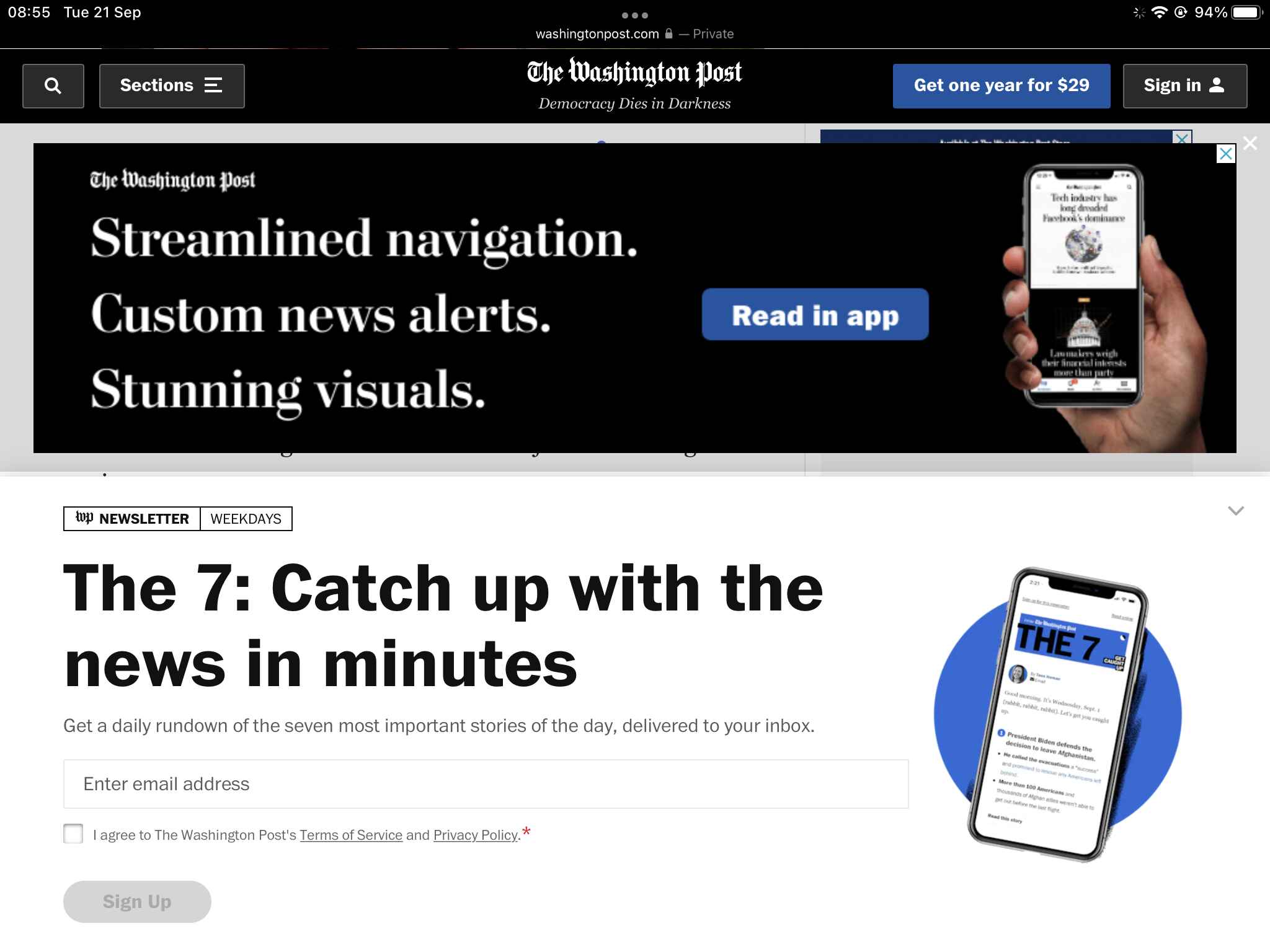 The Washington Post’s website covered by a newsletter prompt as well as an ad for the paper, each taking half the screen